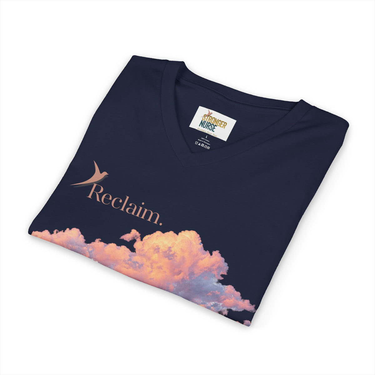 Nurse V-Neck Tee in white, folded — V-neckline with the "Reclaim." sunset cloud print partially visible