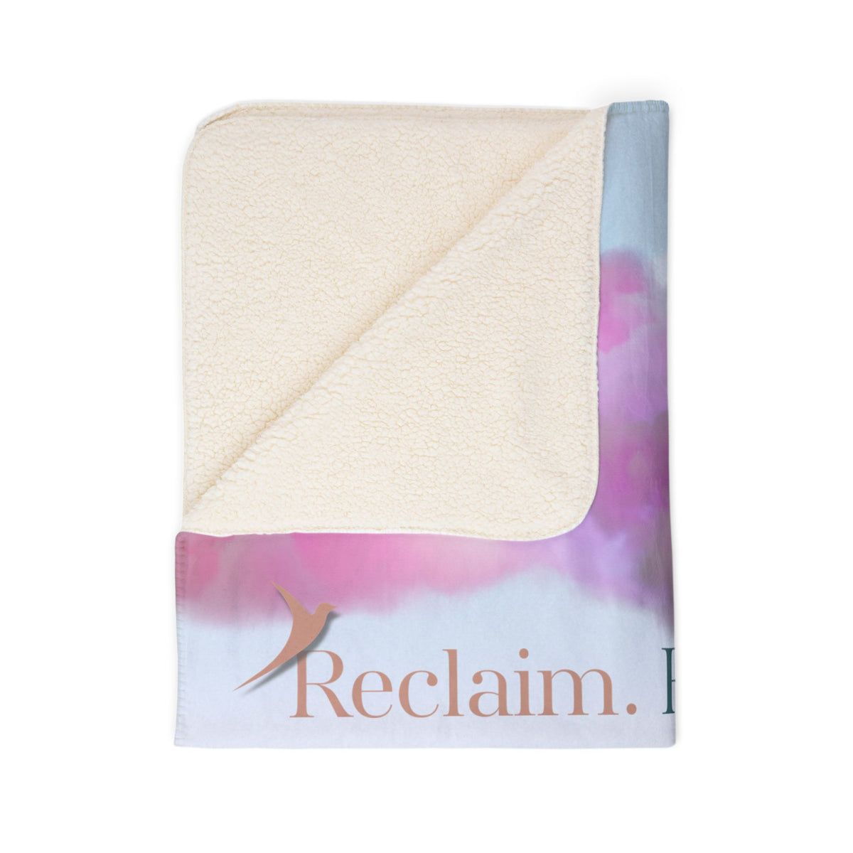 Nurse Sherpa Blanket, folded — cream sherpa fleece back with the pink cloud print and "Reclaim." visible on the front