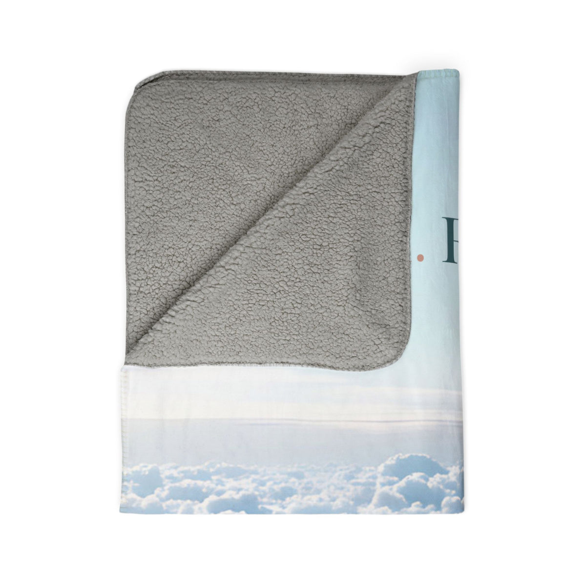 Nurse Sherpa Blanket, folded — gray sherpa fleece back with the blue sky cloud print on the front