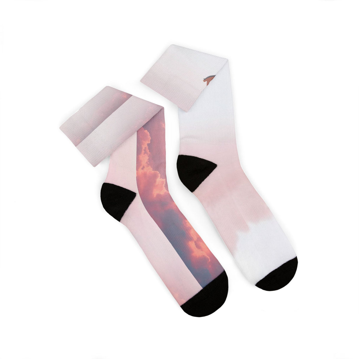 Nurse Crew Socks in blush pink and white — pink sunset cloud print with black toe and heel — pair laid flat with cuffs folded